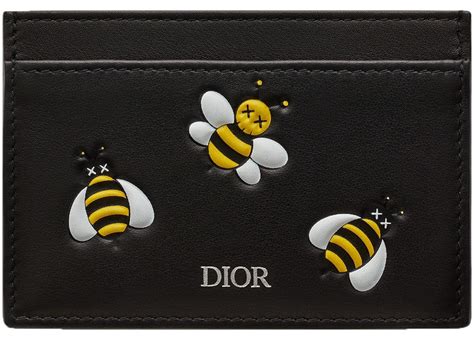 dior card holder kaws